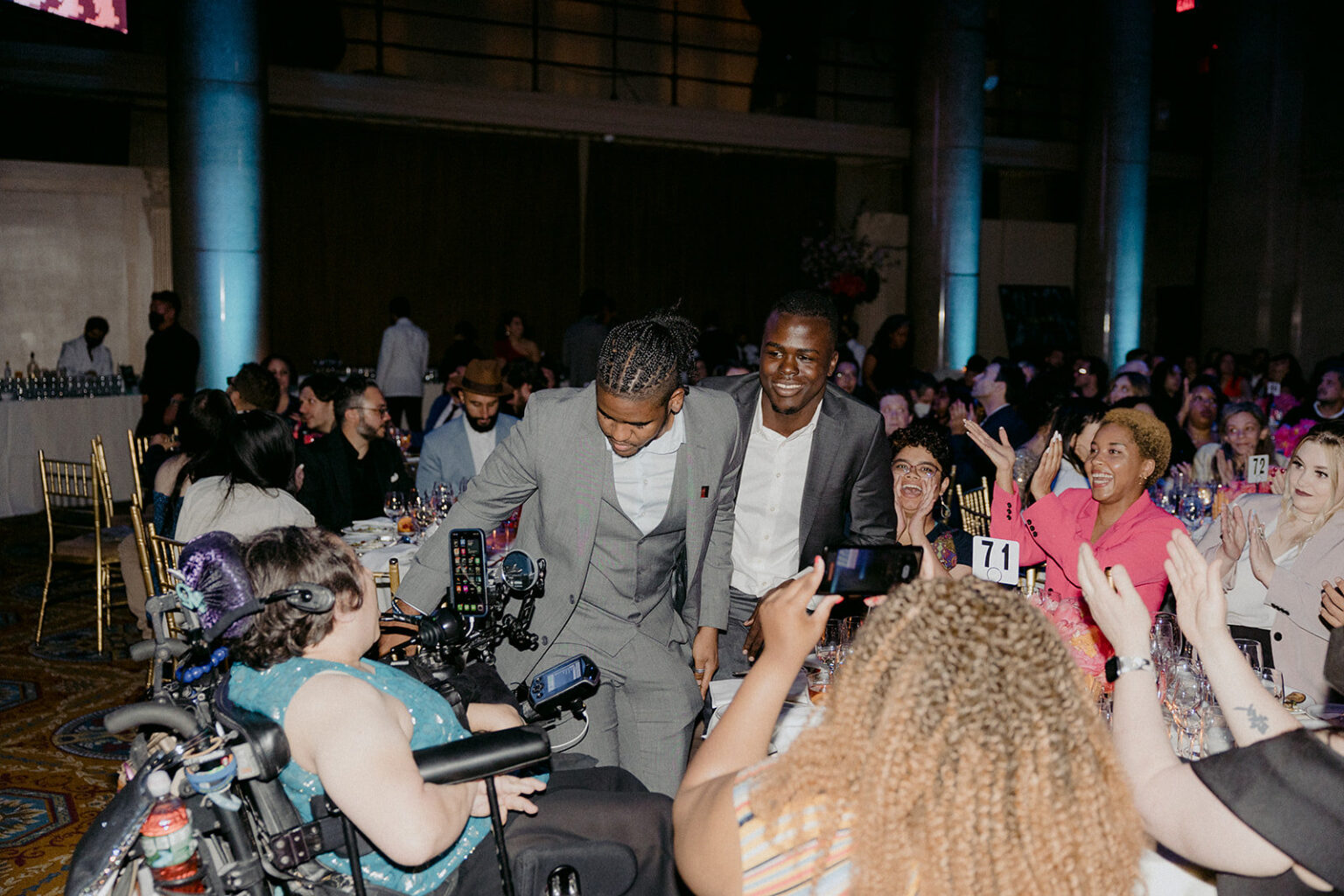 Voxxil co-founder Andrew Garnett receiving the Webby Award in New York